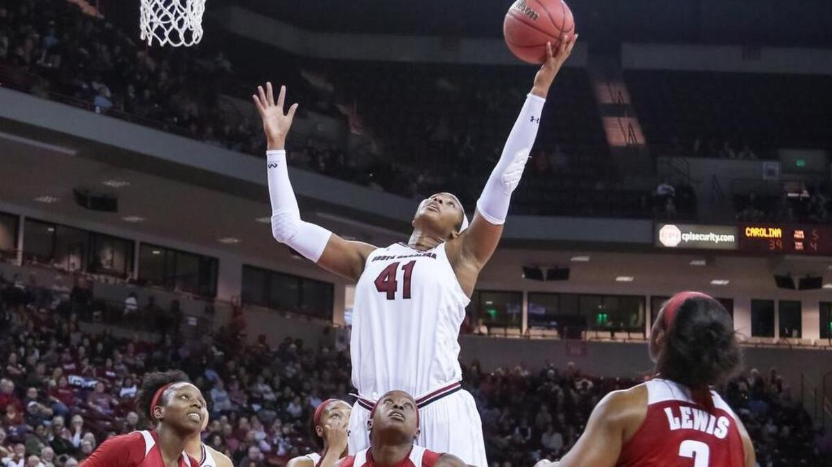 Alaina Coates skies above the Alabama players Sunday at Colonial Life Arena.