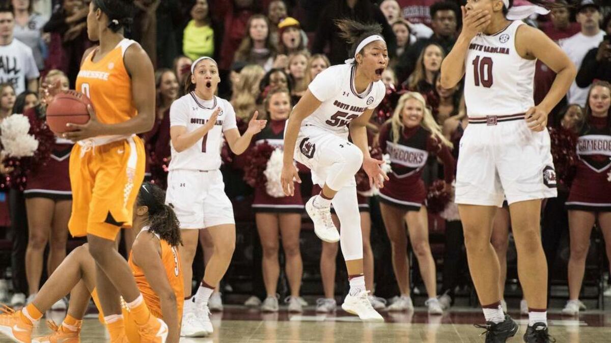 South Carolina’s Tyasha Harris, middle, Allisha Gray, right, and Bianca Cuevas-Moore react to an official’s call during the final minute against Tennessee.