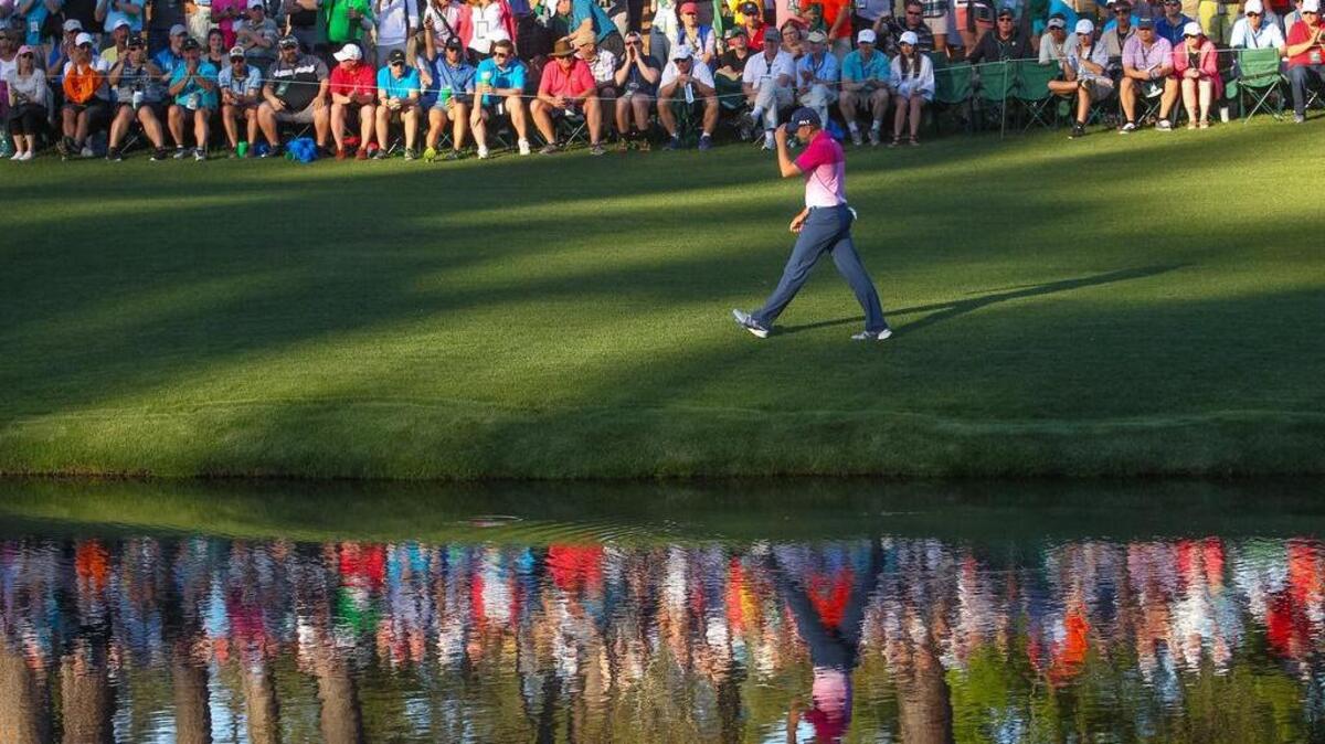 Sergio Garcia tips his hat to the crowd on the 16th hole during the third round of the 2017 Masters golf tournament Saturday. Garcia is tied for the lead.