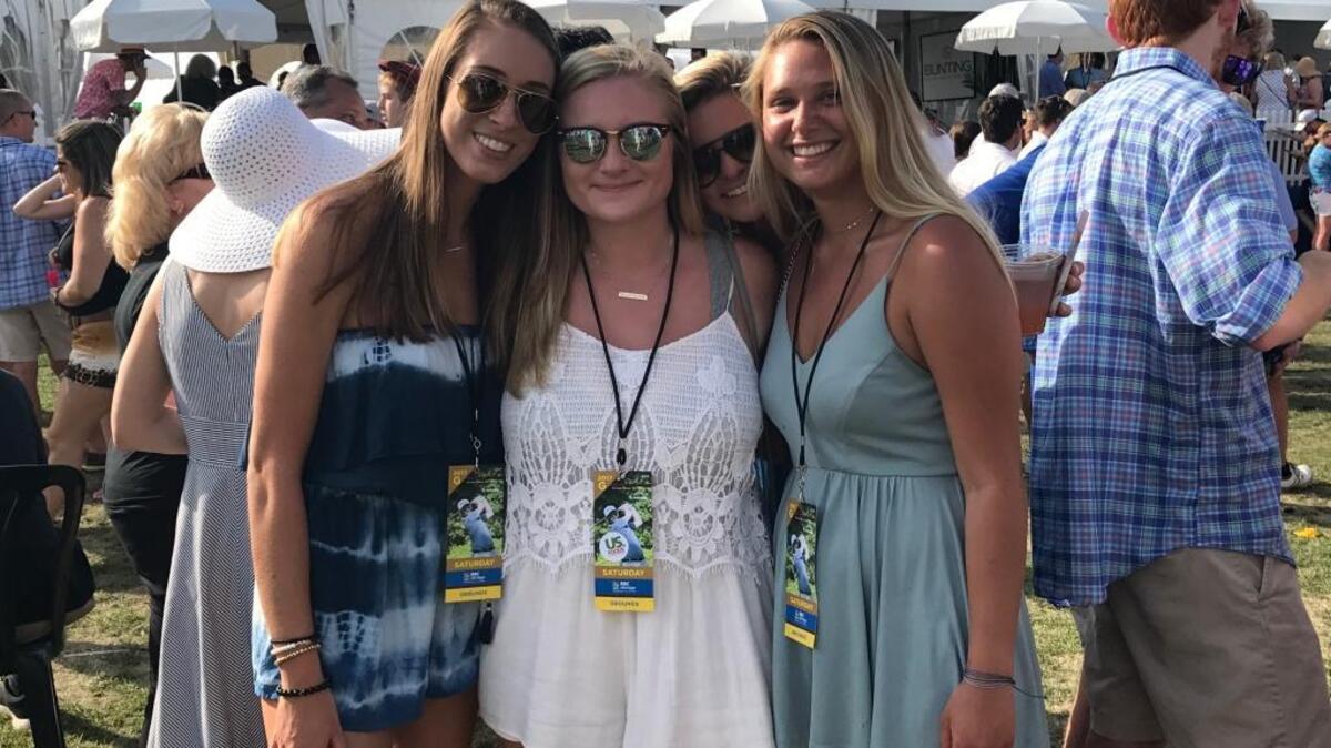 Scottie House, left, and Sarah Donison, middle, and a friend who jumped into the shot, wore rompers, like many other women, to the RBC Heritage Presented by Boeing golf tournament Saturday. They said they enjoyed the convenience and ease of choosing a romper to wear rather than assembling an entire outfit.