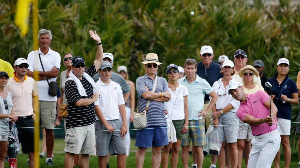 Martin Kaymer, lower right, of Germany, hits onto the green on the second hole during the third round of the Honda Classic golf tournament on Feb. 25 in Palm Beach Gardens, Fla.
