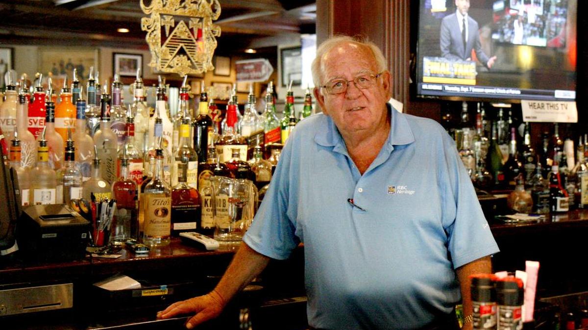 Tom Reilley, co-owner of Reilley’s Grill & Bar on Hilton Head Island, stands behind the bar on April 21, 2017 for a portrait.