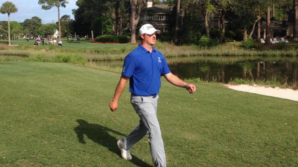 Scott Rohrer, a 26-year-old Clover, S.C., native, walks to the No. 17 green at Harbour Town Golf Links after hitting his tee shot. His ball landed on the green, right in front of the ball of Aaron Baddeley, the PGA Tour pro in Rohrer’s group at Monday’s Pro-Am presented by Boeing.