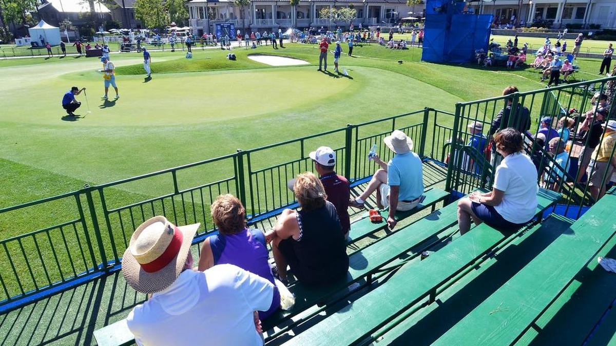 Fans watch the action on the ninth hole during the first round of the RBC Heritage on Thursday at Harbour Town Golf Links.