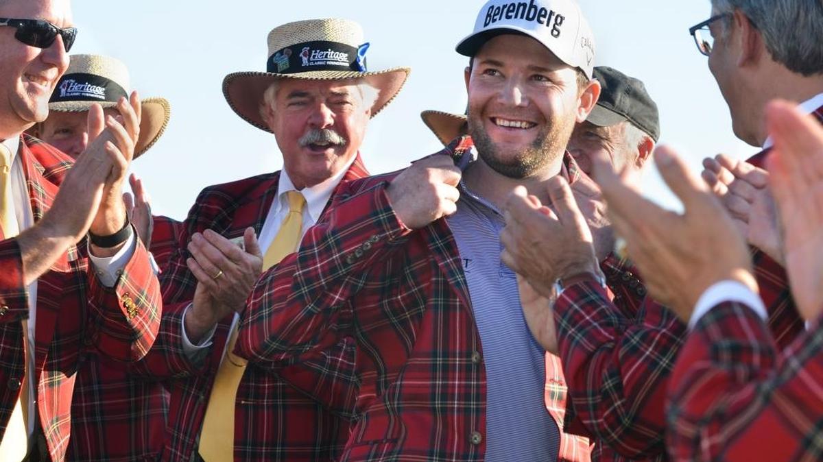 RBC Heritage 2016 champion Branden Grace is applauded as he tries on his tartan jacket during an award ceremony after the final round of the 48th annual RBC Heritage Presented by Boeing golf tournament on Sunday, April 17, 2016 at Harbour Town Golf Links on Hilton Head Island, S.C.