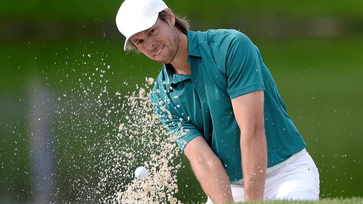 Aaron Baddeley hits out of a bunker during the first round of the Arnold Palmer Invitational on March 17 in Orlando.