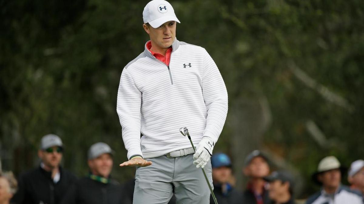 Jordan Spieth urges his ball to slow after hitting from the third tee of the Monterey Peninsula Country Club Shore Course during the first round of the AT&T Pebble Beach National Pro-Am golf tournament Feb. 9, 2017, in Pebble Beach, Calif.