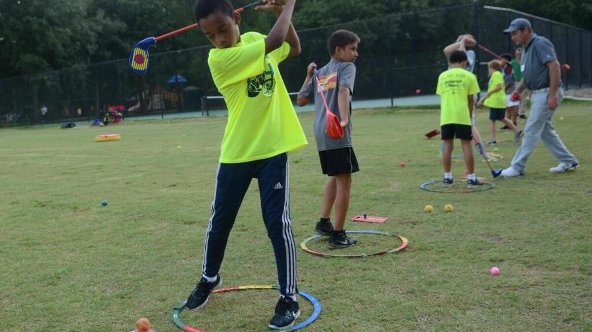 Angelo Garcia, 13, of Hilton Head Island, prepares to swing his club during a game of SNAG Golf on the last day of the Week of Champions on Friday, June 10, 2016, at the new First Tee of the Lowcountry facility on Hilton Head Island. Garcia participated with the First Tee program last year and plans to do it again this October.