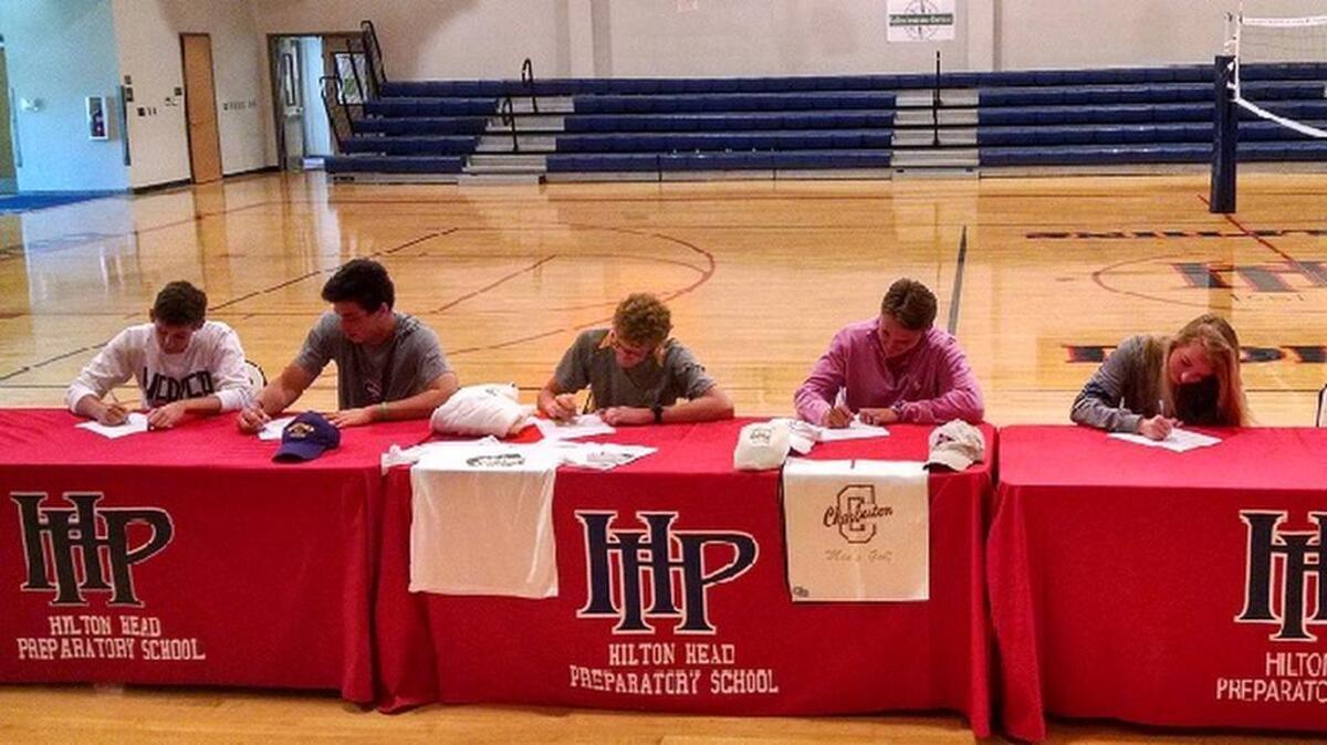 Hilton Head Prep athletes (from left) Sam Fried, Alejandro Becker, Christian Garruppo, Jack Foyle and Jessica Post sign their national letters-of-intent during festivities Thursday.