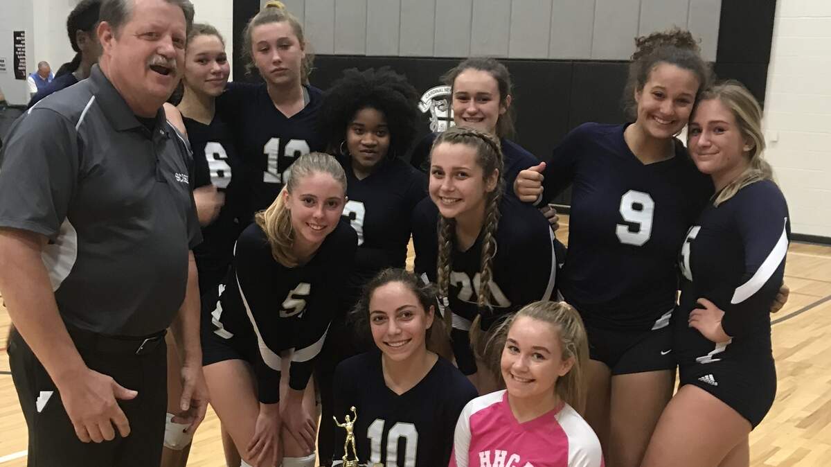 The Hilton Head Christian volleyball team poses for a photo after falling to Spartanburg Christian in the SCISA 2A championship.
