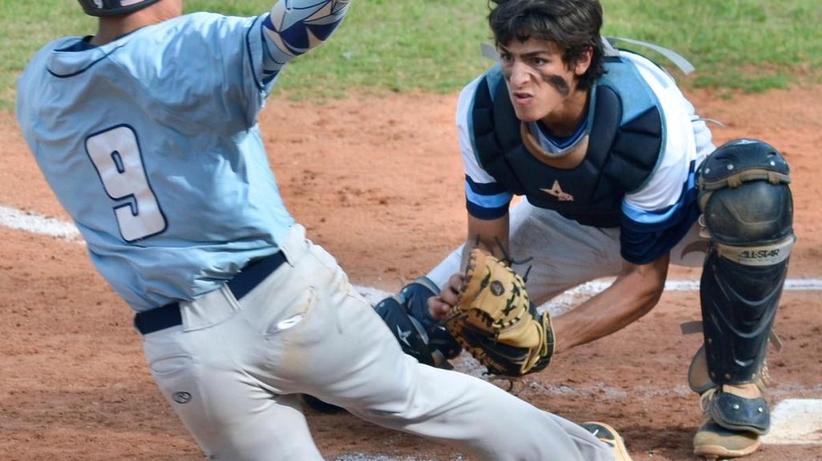 Hilton Head High catcher Dalton Shaw prepares to tag out Chapin baserunner Will Kroske in this play at the plate in the top of the second inning of Monday’s District 7 Class 4A championship game. Kroske was out on the play.