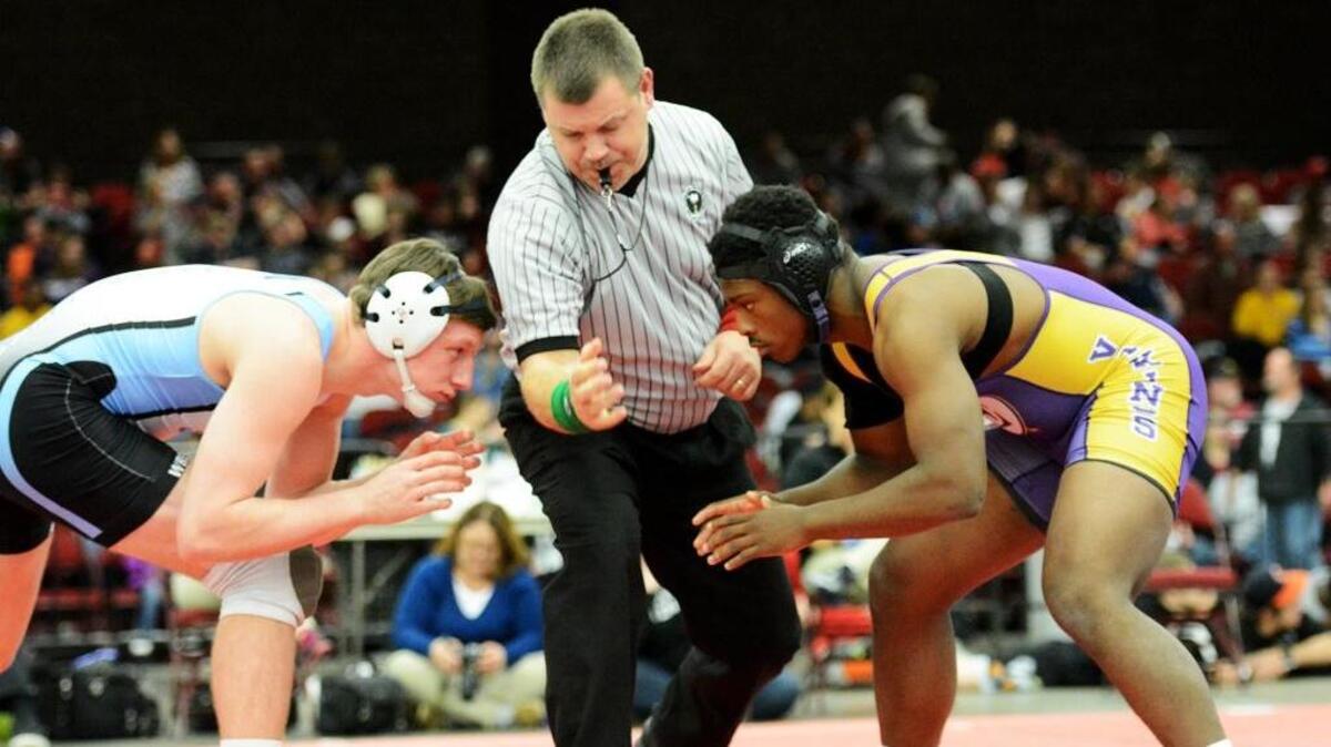 Martin Duane, left, of Hilton Head Island, wrestles against Emerald’s Kivontay Clinkscales in the Class 3-A 182-pound class at the SCHSL State Tournament on Saturday in Anderson.