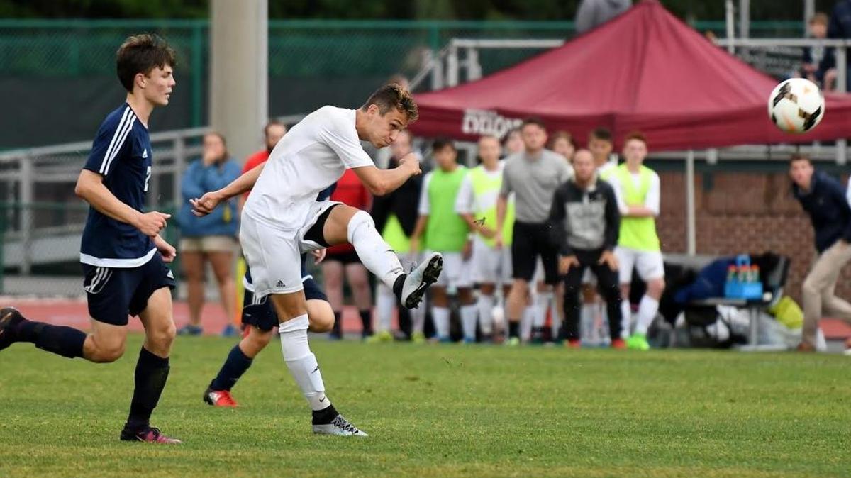 Hilton Head Christian’s Evan Berkner boots the ball in the second half of the SCISA Class 2A state championship game against Oakwood Prep at Porter-Gaud School in Charleston on May 13, 2017.