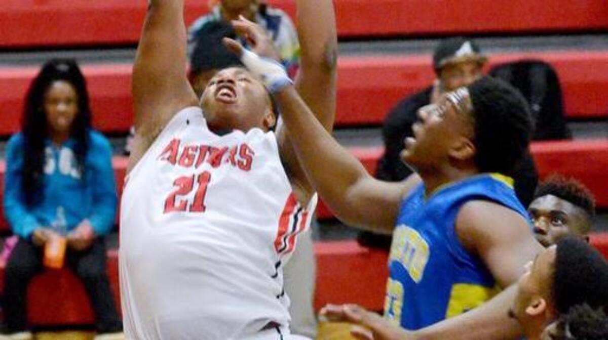 Ridgeland-Hardeeville’s Gaylus Bailey, left, goes up for a shot during Tuesday’s game against Edisto.
