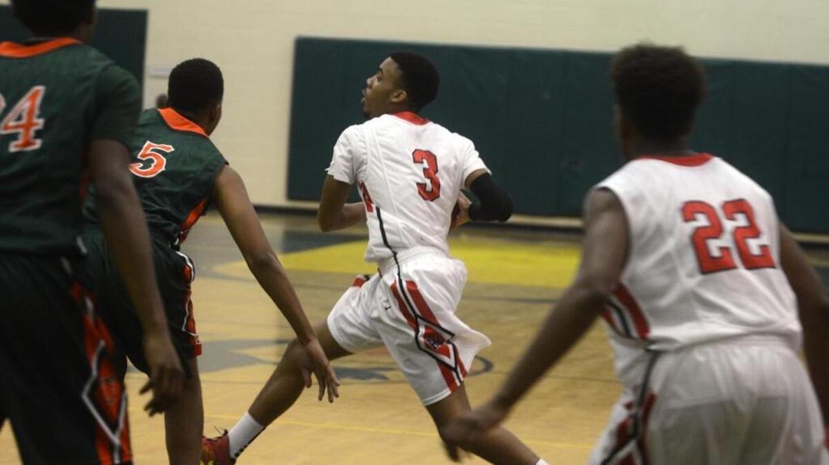 Ridgeland-Hardeeville’s Javon Allen drives with the ball during a game against Timberland in the state quarterfinal Wednesday night at Estill High School.