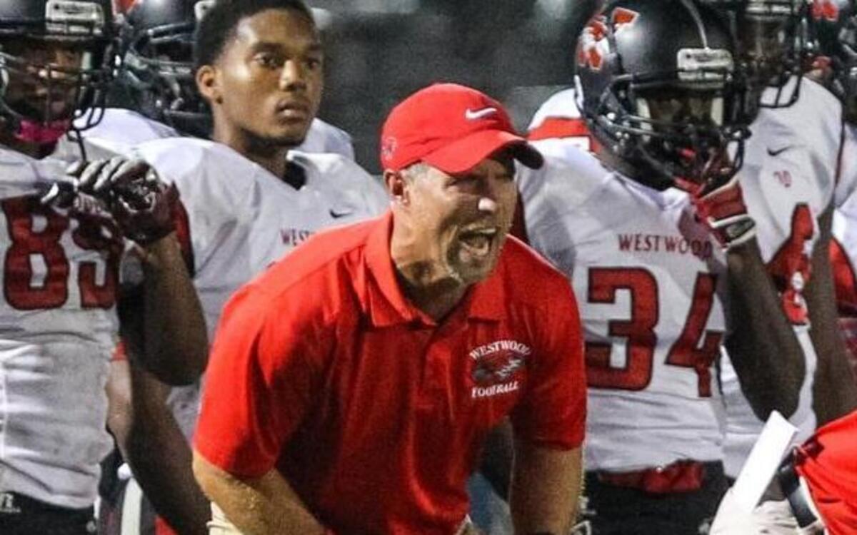 Westwood's head coach Rodney Summers shouts instructions during the Westwood-Lexington football game at Lexington on Sept. 19, 2014. Westwood won the game 32-7.