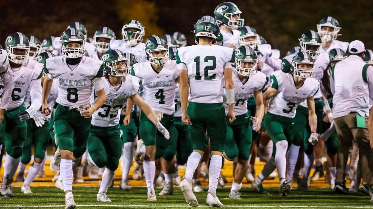 Beaufort Eagles players enter the field before their game against the South Pointe Stallions the Class 4A SC State Championship Game at Benedict College in Columbia, SC, Thursday night, December 2, 2021.
