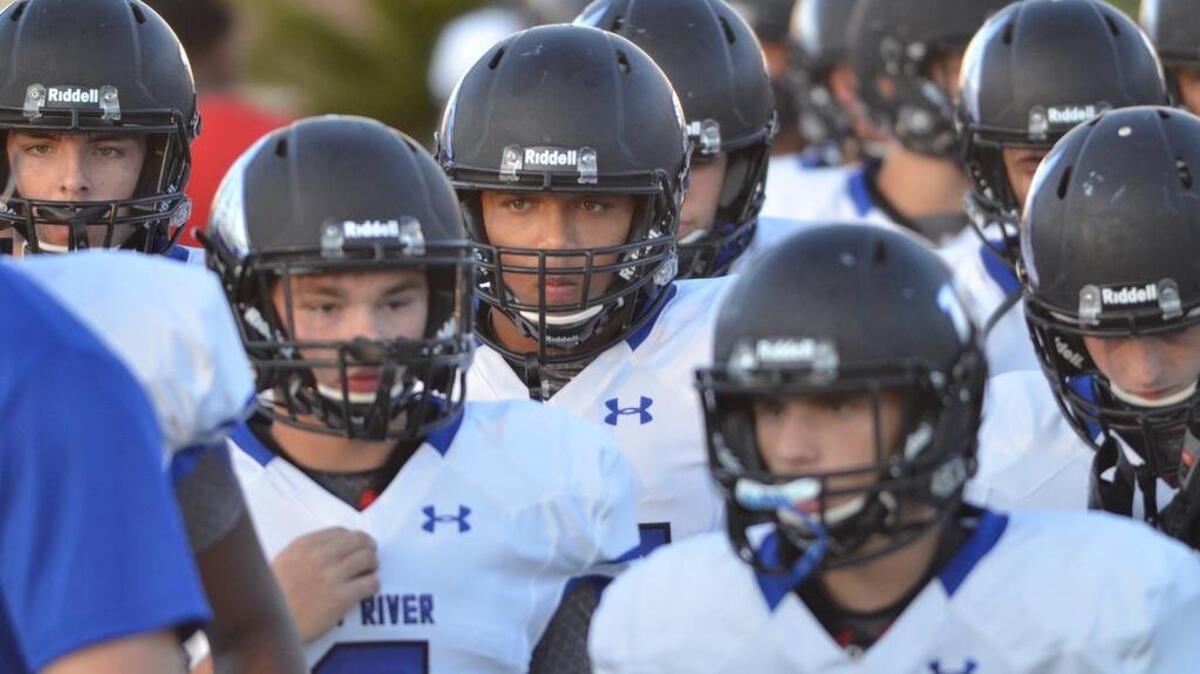 The May River High School Sharks football team plays its first ever game with its crosstown rival, the Bluffton Bobcats, at Bluffton High School on Friday, Aug. 26, 2016.
