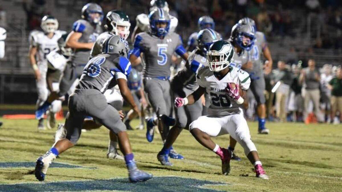 Beaufort High junior James Degin crosses into May River’s end zone for the game’s first points of the night.