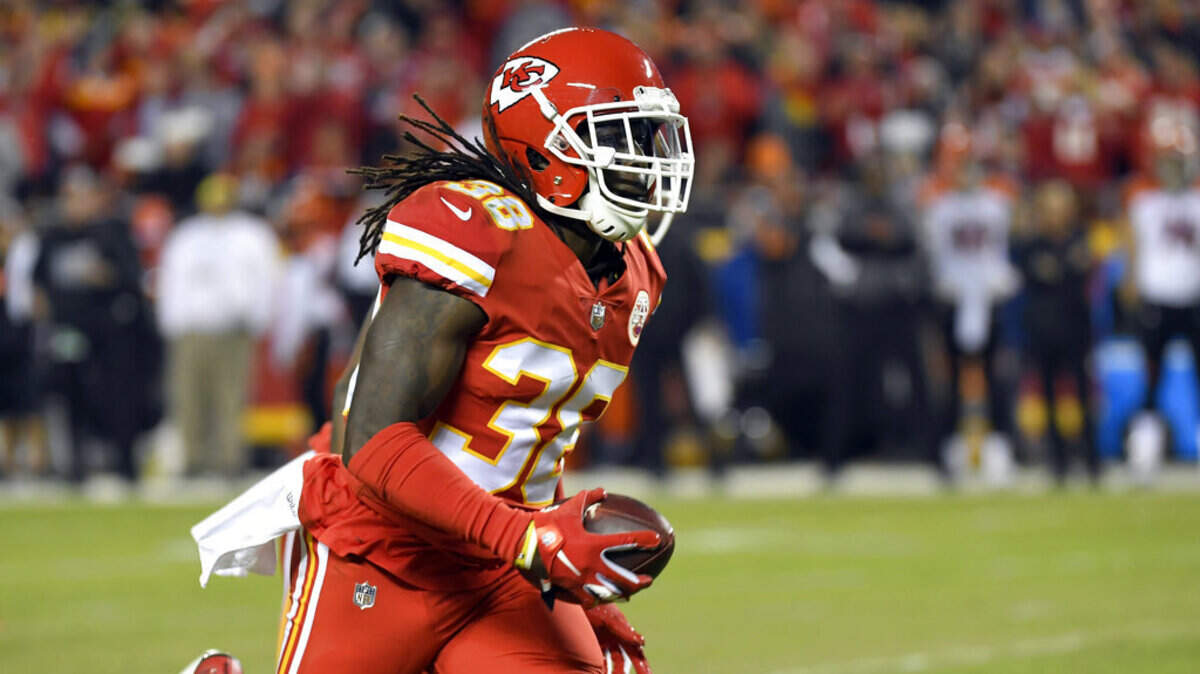 Kansas City Chiefs defensive back Ron Parker (38) runs for a touchdown after intercepting a throw by Cincinnati Bengals quarterback Andy Dalton, in the second half of an NFL football game in Kansas City, Mo., Sunday, Oct. 21, 2018.