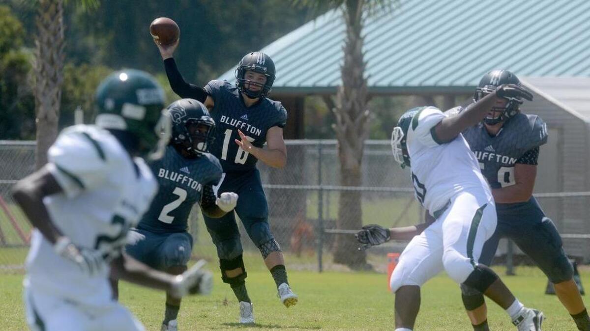 A pass is thrown during the Bluffton High vs. Beaufort High football game on Sept. 3 at Bluffton High School in Bluffton.