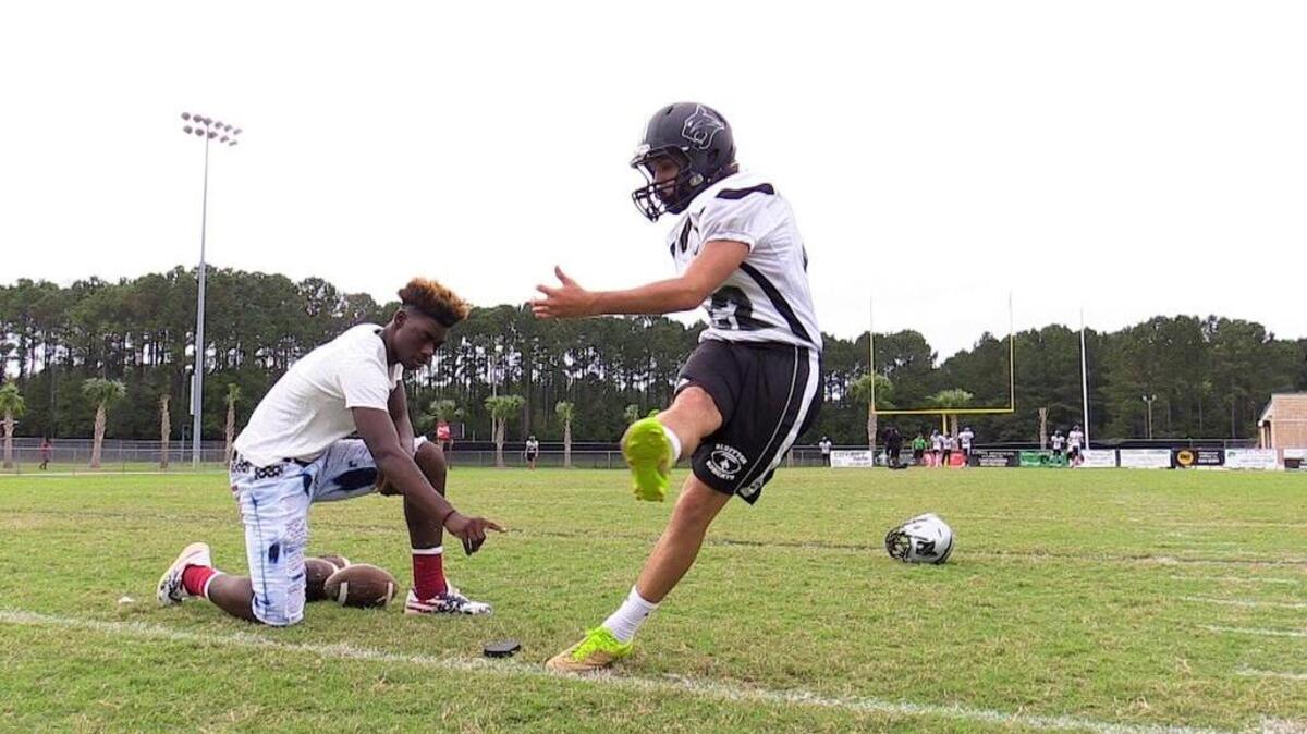 D.J. Chappelear, a kicker and punter on the Bluffton High School football team, works on his craft at practice Monday. In the Bobcats’ Sept. 30 win at May River, Chappelear made nine field goals, tying the national high school record.
