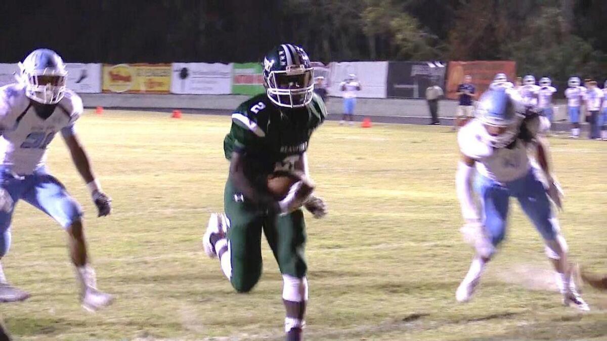 Beaufort running back Omar Cummings scores a touchdown in the first half of the Eagles’ home win over Hilton Head on Oct. 28.