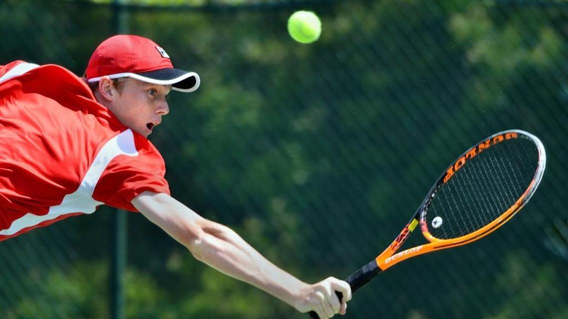 Hilton Head Prep’s Marcus Ferreira stretches for a shot in his No. 1 singles match against Hilton Head Christian’s Cameron Clark during the SCISA Class 2A state championship match Thursday at Hilton Head Beach & Tennis Resort.