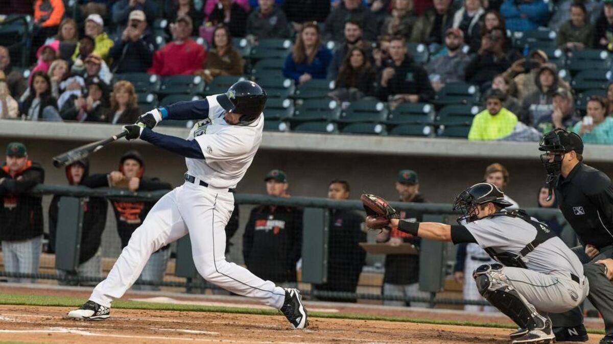 Tim Tebow hits a home run Thursday in his first at-bat with the Columbia Fireflies.