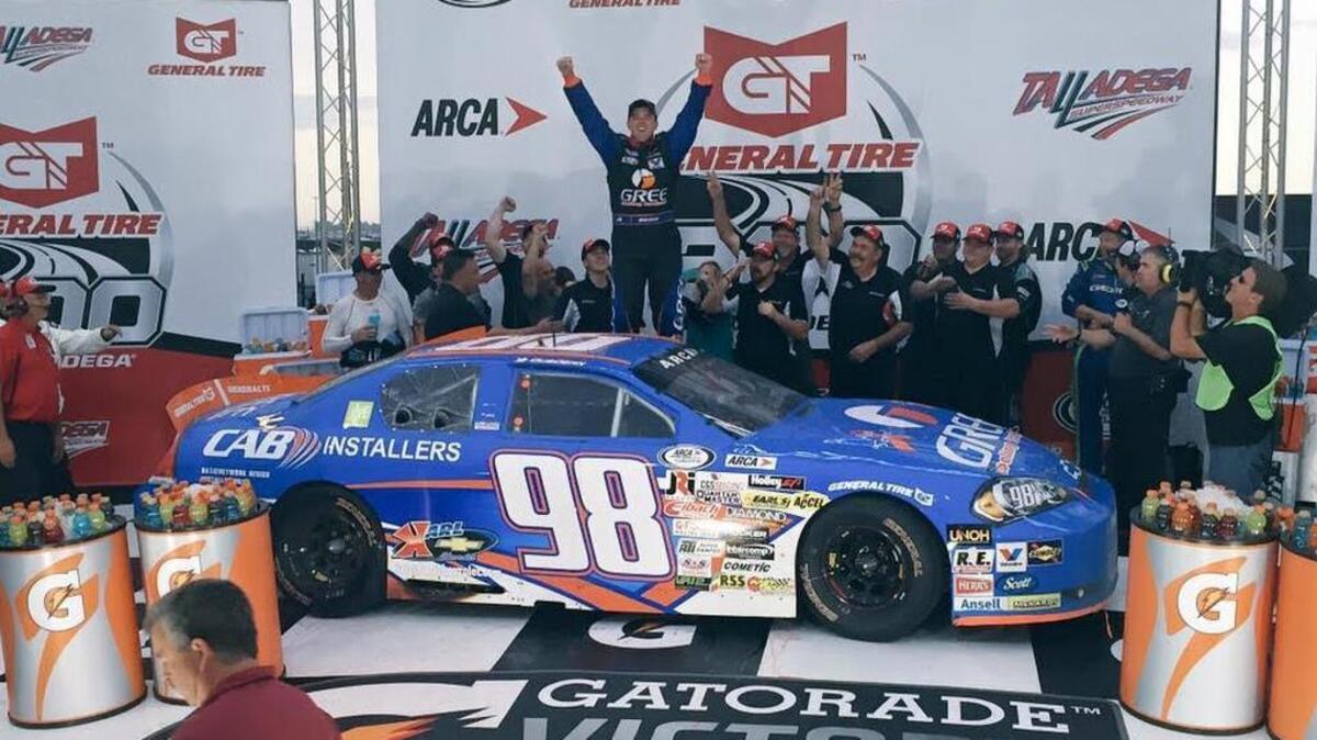 Bluffton’s Gus Dean celebrates victory in Friday evening’s General Tire 200 on the ARCA racing circuit. Dean’s triumph came one start after being taken out in a nine-car wreck two months ago at Daytona.