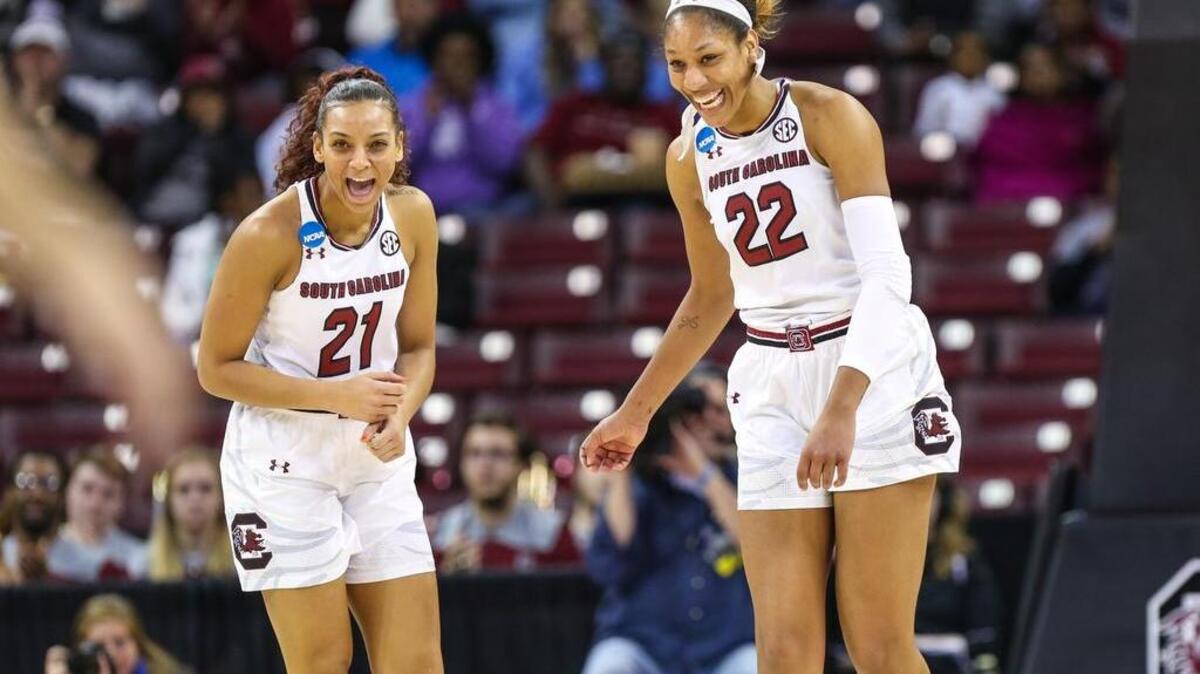 South Carolina's Mikiah Herbert Harrigan (21) and A'ja Wilson (22) celebrate Friday against UNC Asheville during the first round of the NCAA Tournament in Columbia.