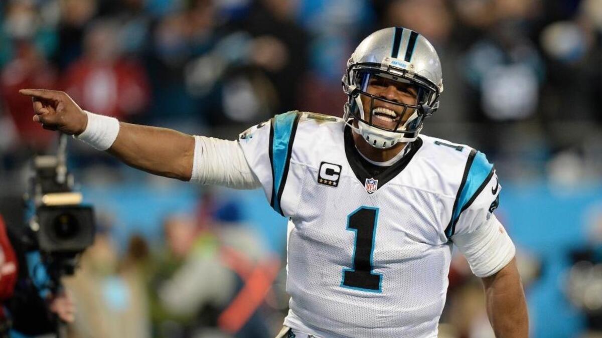 Cam Newton celebrates a fourth quarter touchdown during NFC Championship game on Sunday, January 24, 2016.