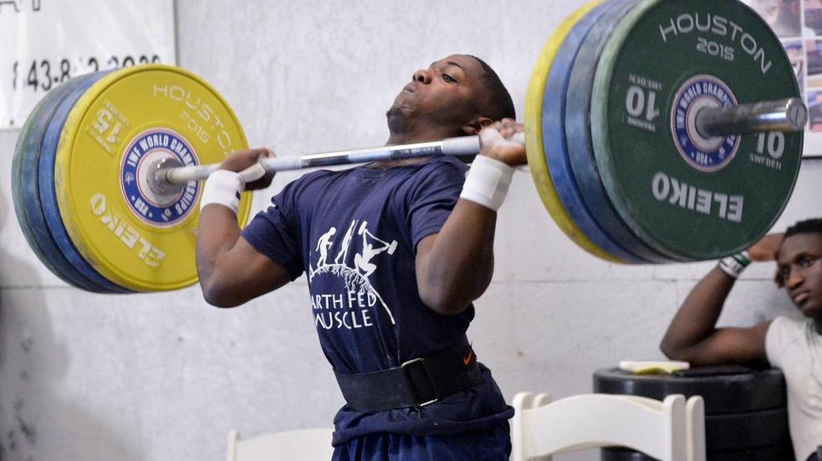 CJ Cummings lifts 150 kilos at CrossFit Beaufort during his daily workout on April 4. On Saturday, the 16-year-old phenom broke one of his June records, matched another and swept all three gold medals in the 69-kilogram weight class at the IWF Youth World Championships in Penang, Malaysia.