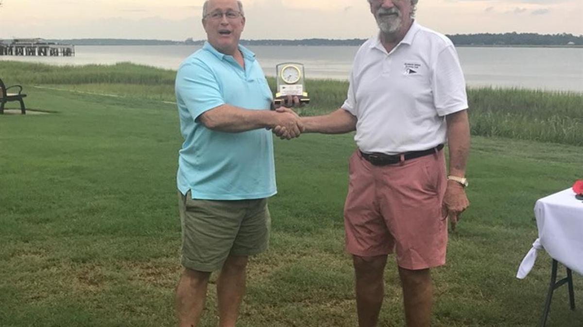 Gabrel Cease, left, along with Dave Brown, Darrell Tutchton, Shane McCarthy, Steve McCarthy and Michael “Mad Dog” Doyle came in first place in the Spinnaker group at the second annual Low Country Hook Race.