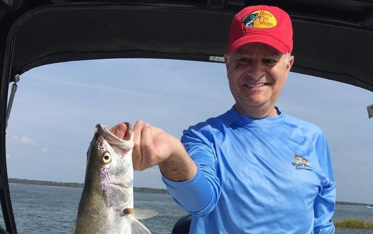 Bass Pro Shops chief Jim Hagale shows off one of his gator trout caught during last week’s Lowcountry visit.