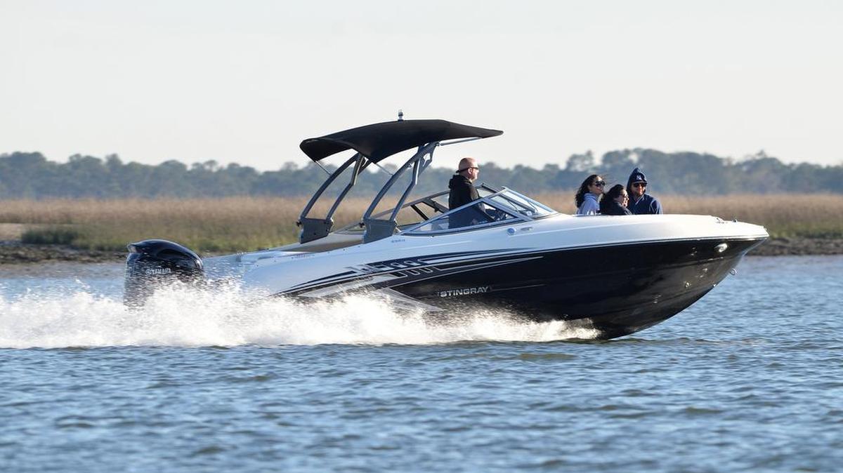 A group enjoys a speedboat ride along the May River on the evening of March 3, 2017.