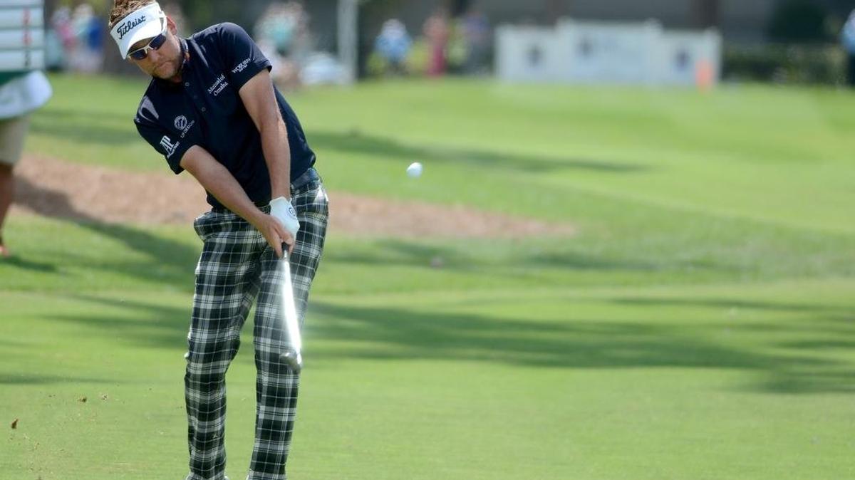 Ian Poulter hits his ball from the fairway of No. 9 during the second round of the RBC Heritage on Friday at Harbour Town Golf Links.