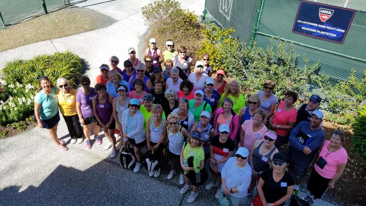 Members of the Tennis Association of Hilton Head Island pose for a group photo.